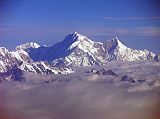 
Shishapangma, the 14th highest mountain in the world at 8012m, shines in the early morning sun from Kathmandu’s Mountain flight. The steep and treacherous southwest face is in shadow on the left. The north face is just visible in the sun on the right. On the far right the pointy rocky peak is Phola Gangchen (7716m), first climbed in 1981, and to its left is Shishapangma’s East face.
